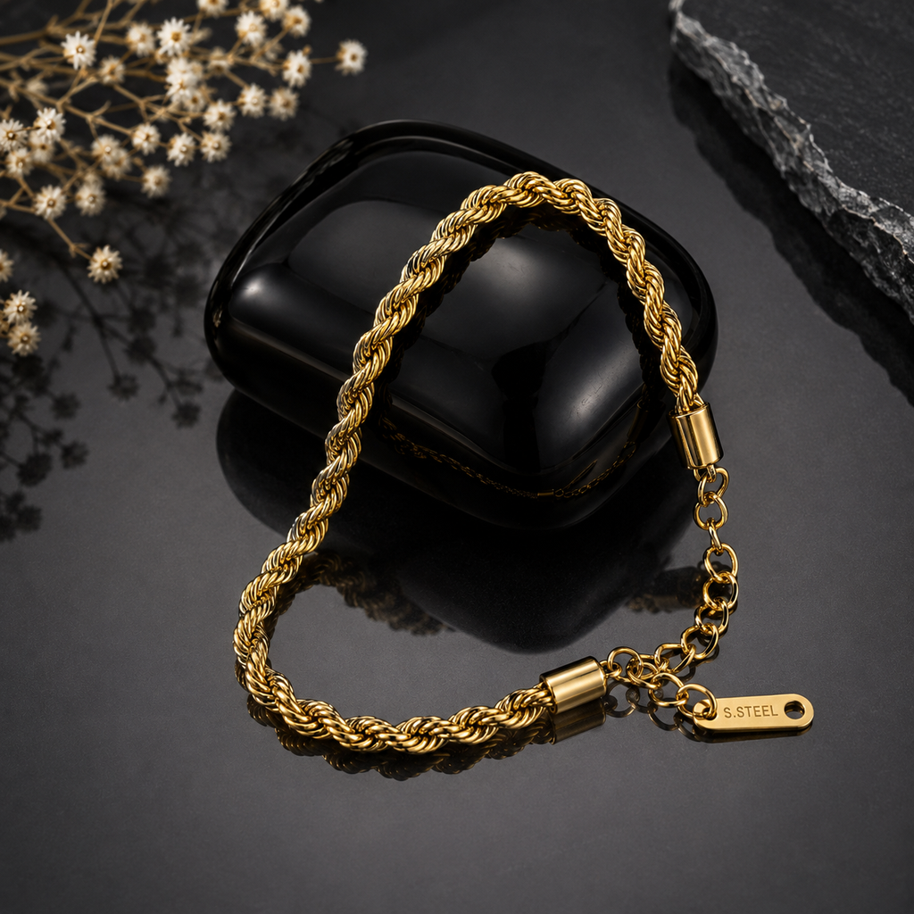 Elegant gold-tone stainless steel twisted rope bracelet with braided chain design and polished finish