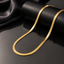 Elegant gold-tone snake chain necklace with sleek flexible design and polished finish