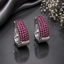 Elegant silver CZ hoop statement earrings with sparkling clear stones and polished silver-tone finish