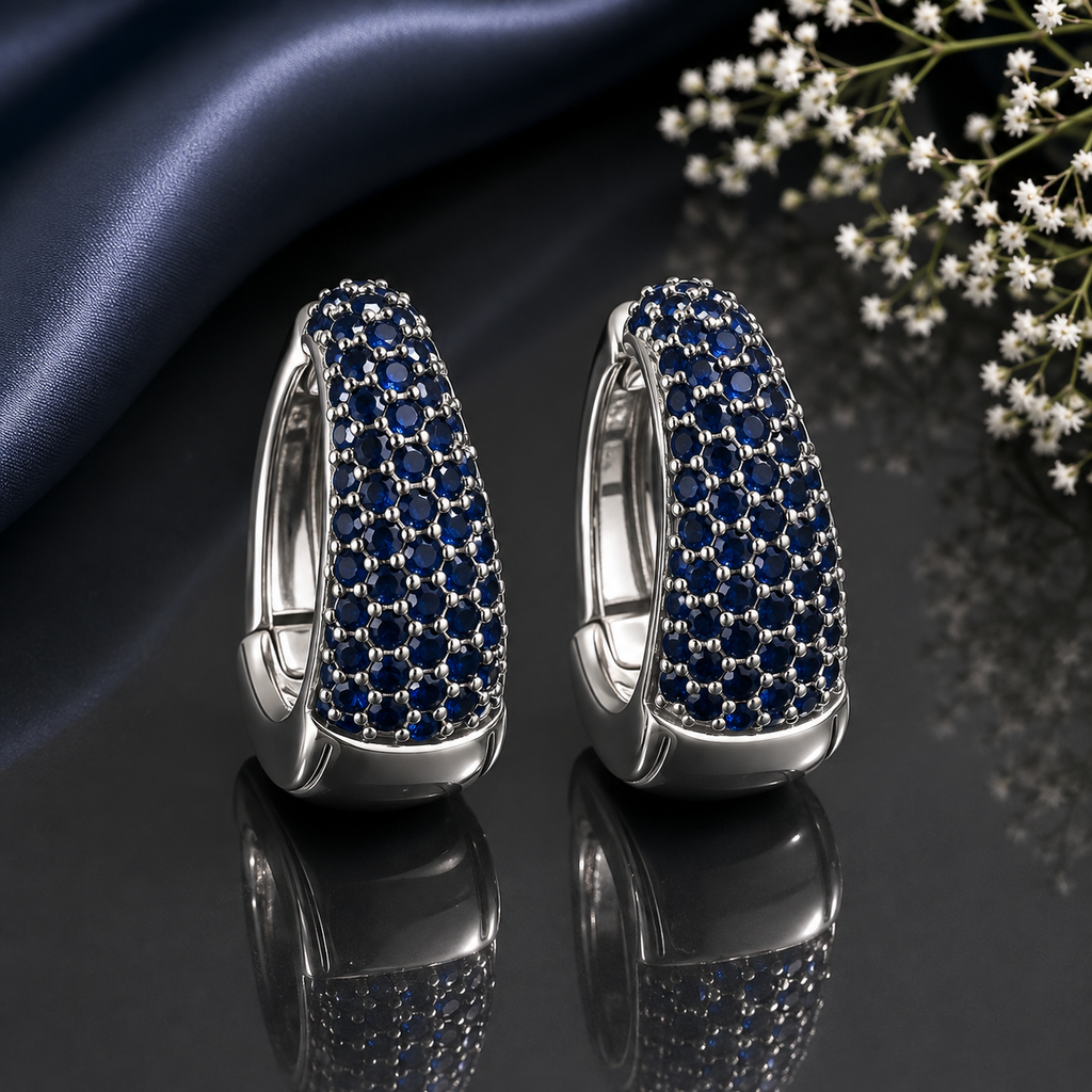 Elegant silver CZ hoop statement earrings with sparkling clear stones and polished silver-tone finish