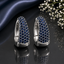 Elegant silver CZ hoop statement earrings with sparkling clear stones and polished silver-tone finish