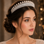 Elegant pearl crystal royal tiara with sparkling silver-tone detailing and bridal crown design