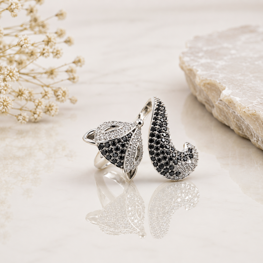 Elegant silver black CZ leaf design statement ring with sparkling black and clear stones