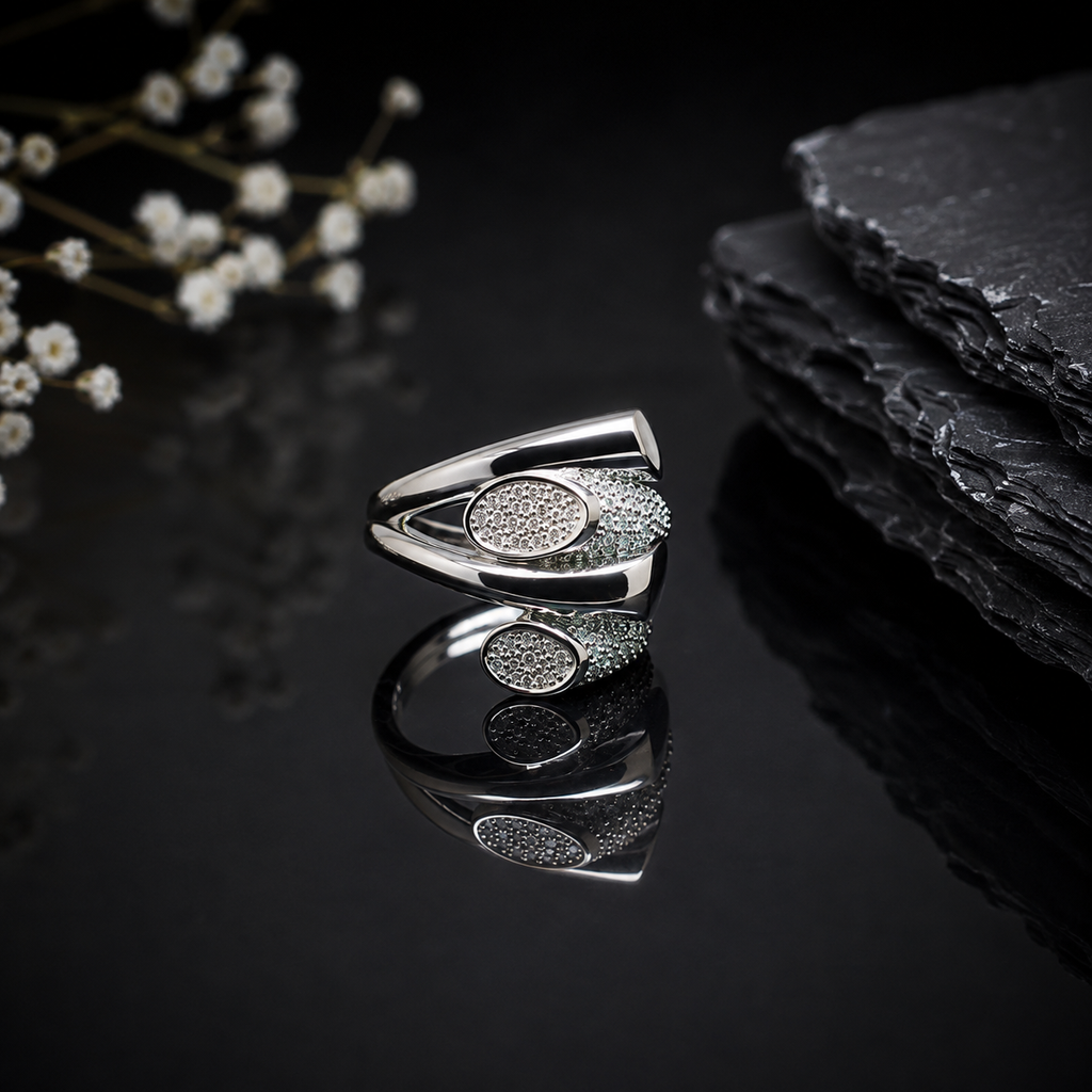 Elegant silver oval CZ open band statement ring with sparkling centerpiece and polished silver-tone finish