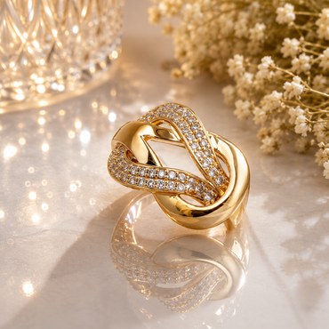 Elegant gold-tone interlocking CZ ring with sparkling stone detailing