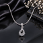 Elegant silver-tone floral crystal pendant necklace with sparkling stones and polished finish