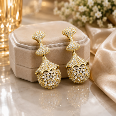 Royal gold-plated crystal drop earrings with intricate sparkling detailing