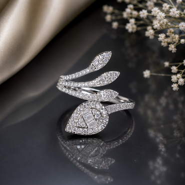 Elegant silver CZ leaf wrap statement ring with sparkling crystals and baguette-style detailing