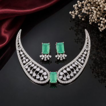 Elegant AD necklace set with intricate openwork detailing, rectangular centerpiece and matching statement earrings