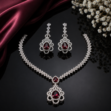 Elegant red stone American Diamond necklace and matching earrings set with sparkling silver-tone detailing