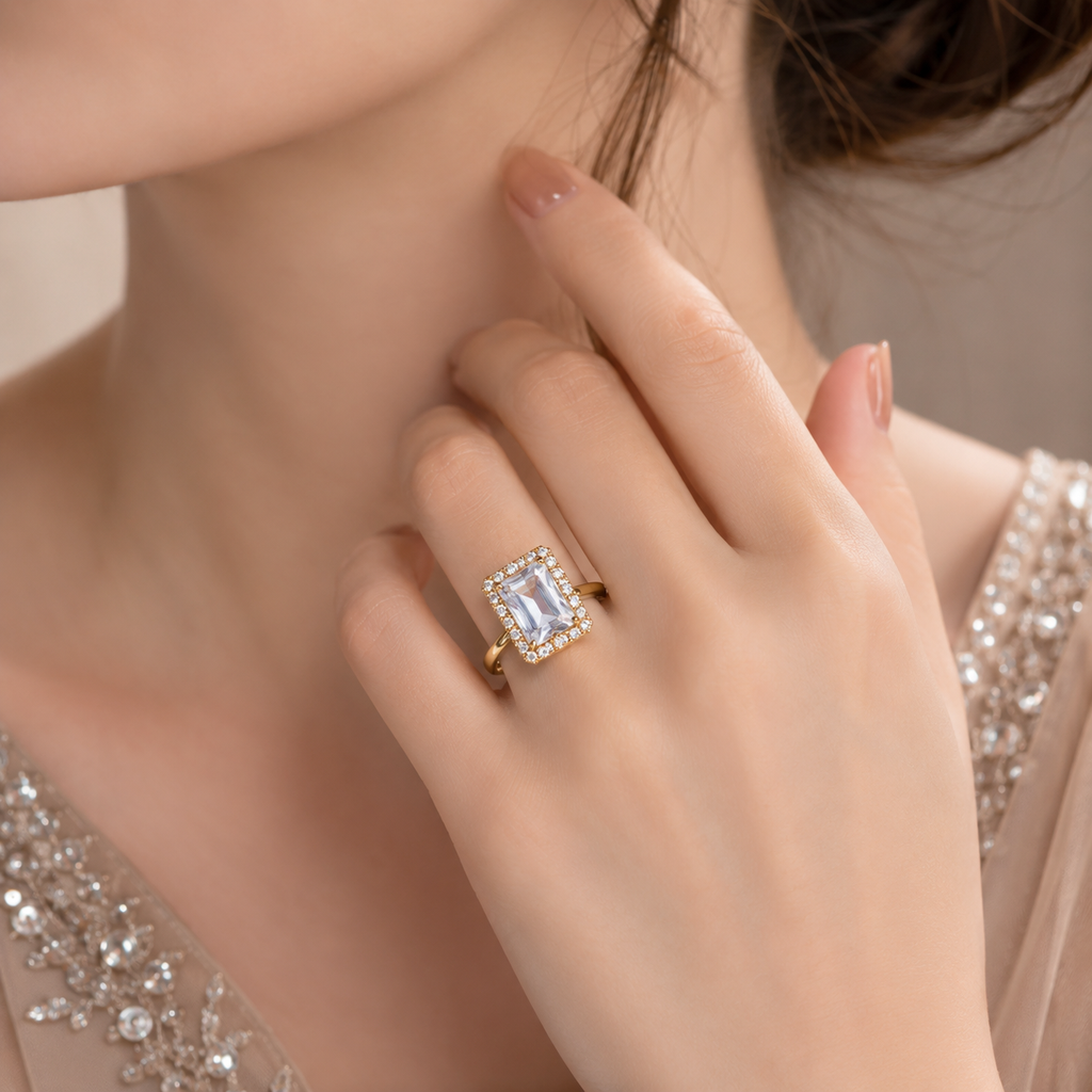 Elegant gold-tone rectangular CZ statement ring with sparkling crystal detailing and polished finish