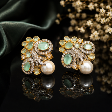 Elegant gold-tone crystal pearl statement earrings with intricate floral detailing and pearl drops