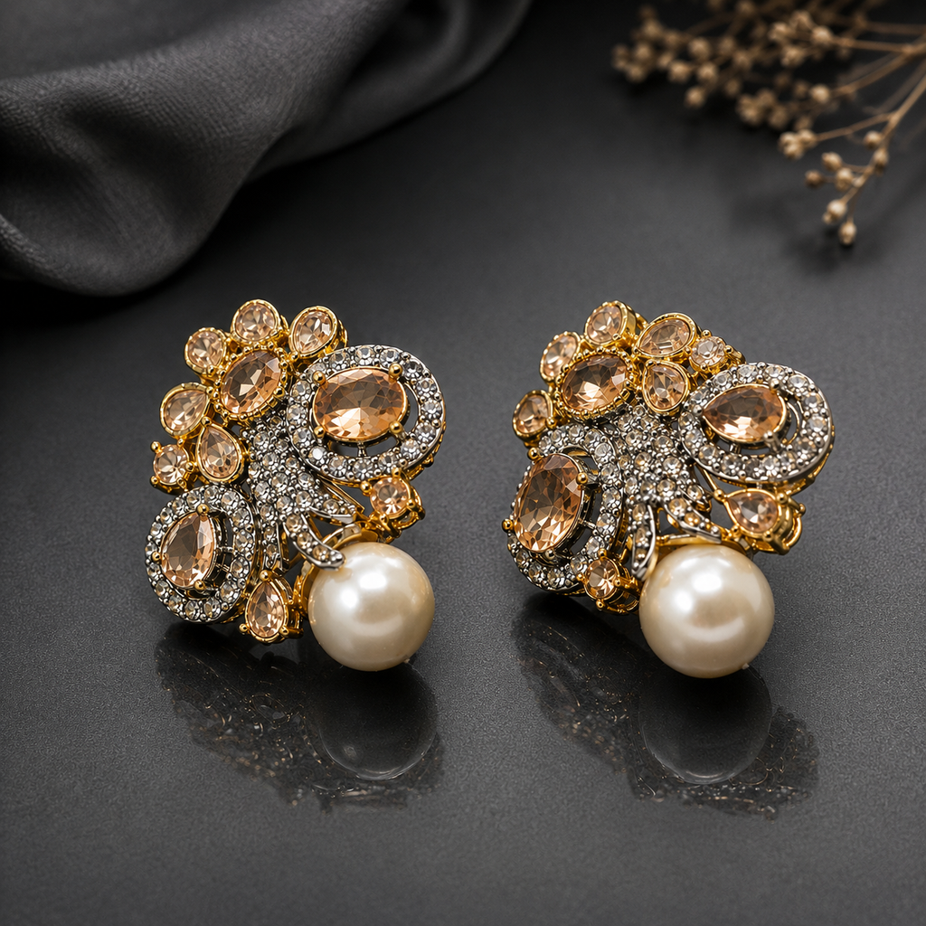 Elegant gold-tone crystal pearl statement earrings with intricate floral detailing and pearl drops