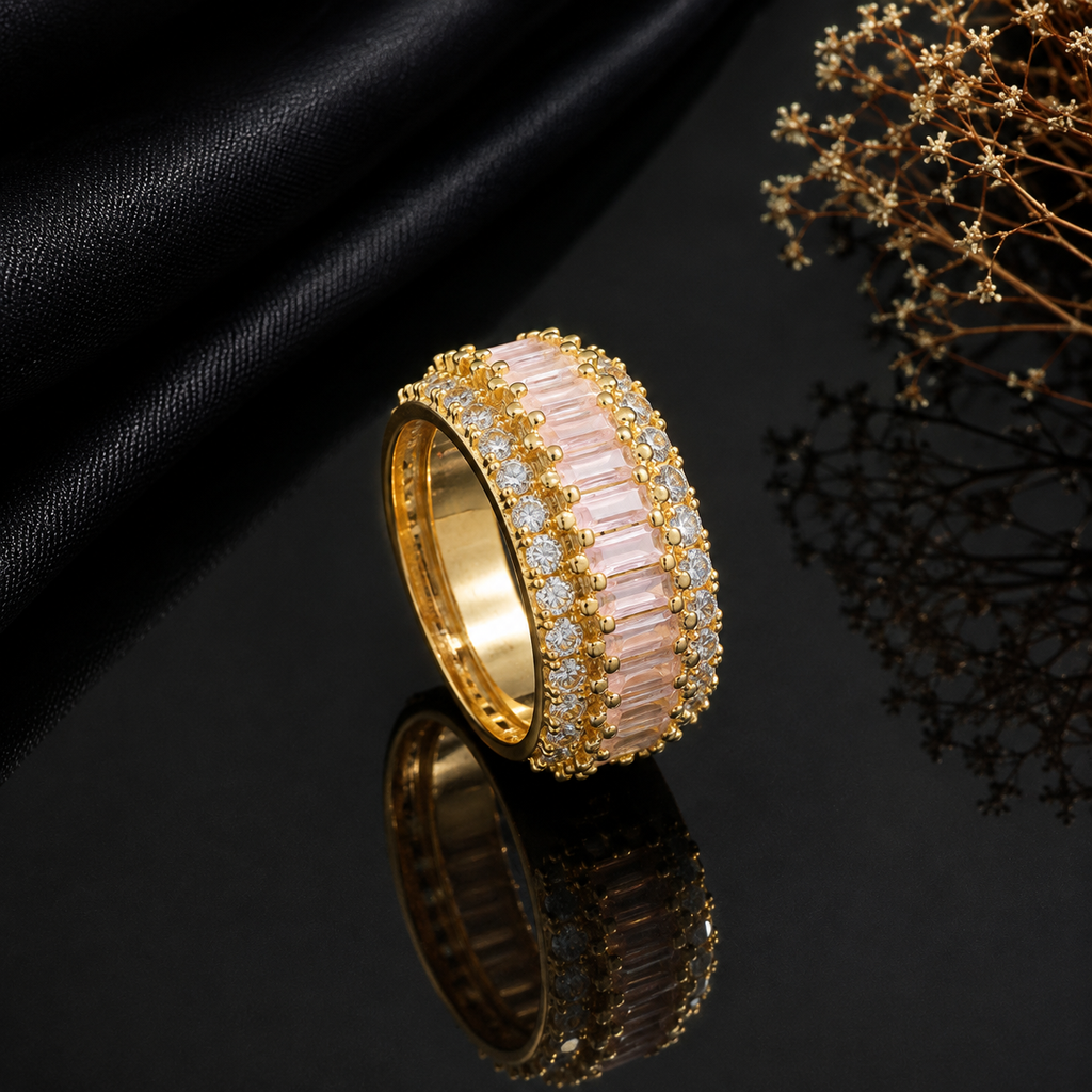 Elegant gold-tone pink CZ statement ring with baguette-cut pink stones and sparkling clear detailing