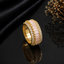 Elegant gold-tone pink CZ statement ring with baguette-cut pink stones and sparkling clear detailing