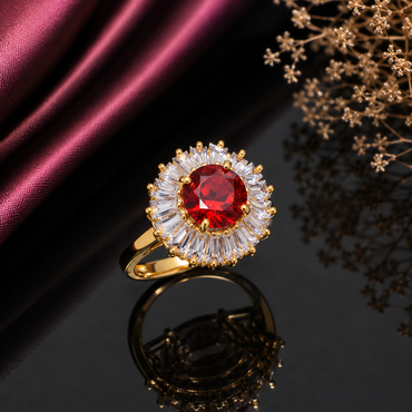 Elegant red CZ halo statement ring with round red center stone and sparkling baguette-cut clear stones