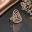 Elegant rose gold-tone spiral CZ statement ring with layered curved design and sparkling pavé detailing