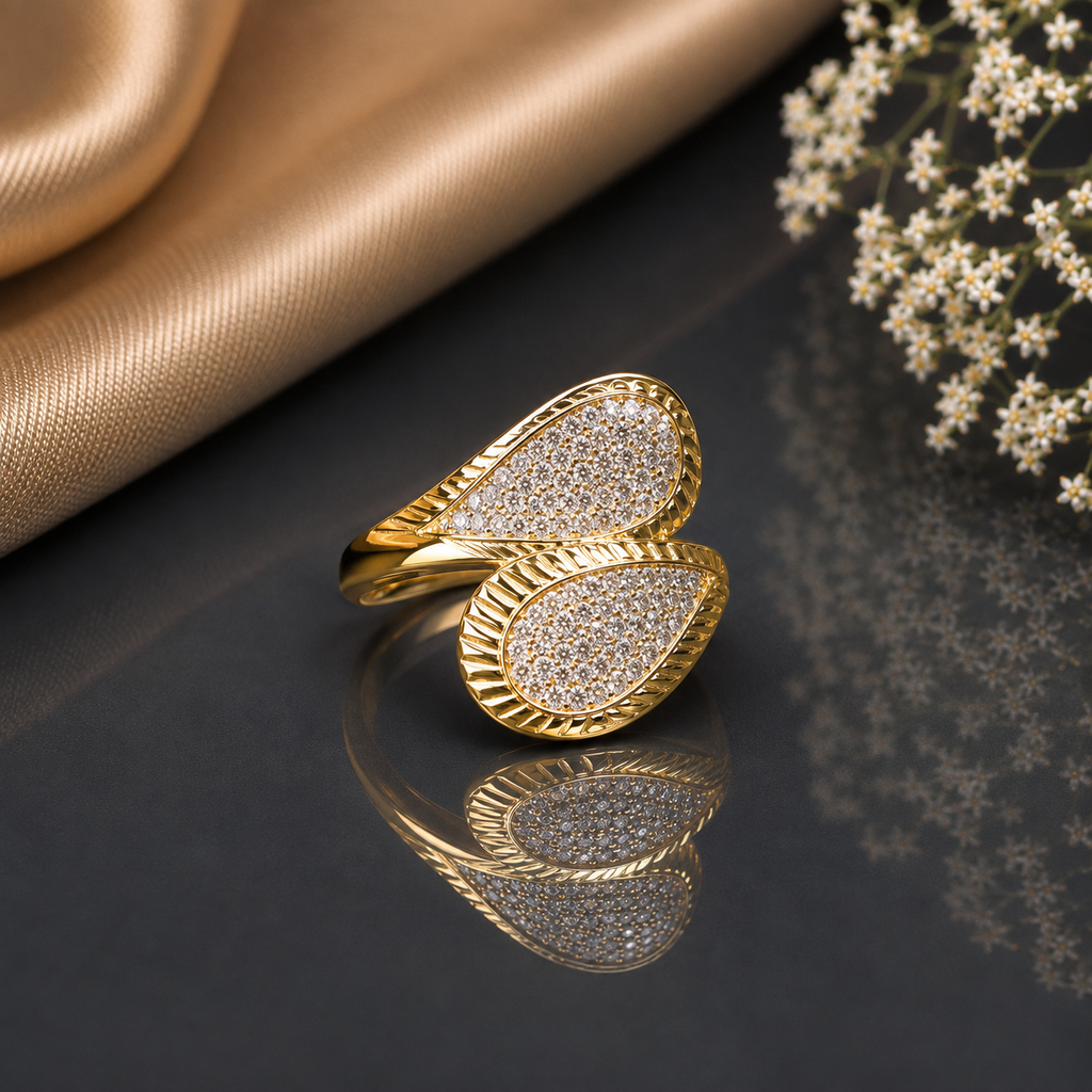 Elegant gold-tone double leaf CZ statement ring with sparkling pavé detailing and textured leaf-inspired borders