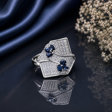 Elegant geometric crystal statement ring with intricate sparkling stone detailing and bold modern design