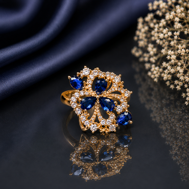 Royal blue and pink floral crystal statement ring with sparkling stones and elegant gold-tone finish