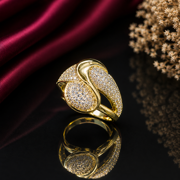 Elegant gold-tone triple oval CZ statement ring with sparkling pavé detailing and overlapping oval design