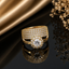 Elegant gold-tone floral CZ statement ring with brilliant round center stone and sparkling pavé detailing