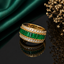 Elegant gold-tone green stone CZ statement ring with rectangular green stones and sparkling crystal detailing