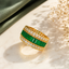 Elegant gold-tone green stone CZ statement ring with rectangular green stones and sparkling crystal detailing