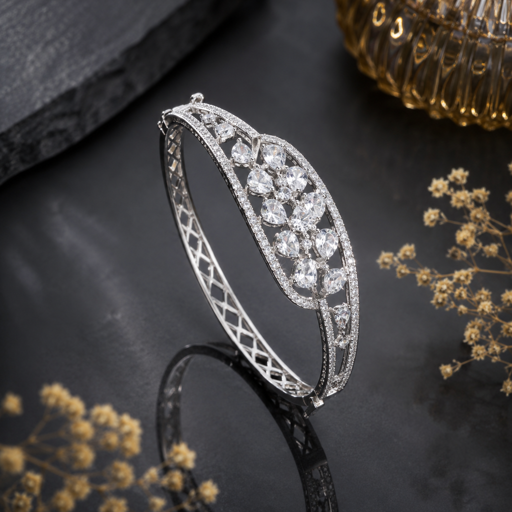 Elegant silver-tone CZ crystal bracelet with floral-inspired design and sparkling stones
