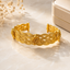Elegant Golden Floral Cuff Bangle