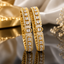 Gold‑Tone American Diamond Designer Bangles Set