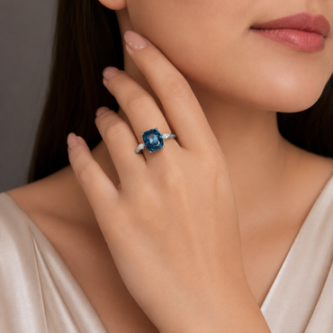 Blue Cushion-Cut Statement Ring with Marquise Accents