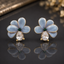 Blue Floral Stud Earrings – Rs. 550