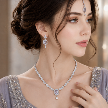 Elegant AD necklace and matching earrings set with sparkling rectangular centerpiece and silver-tone finish