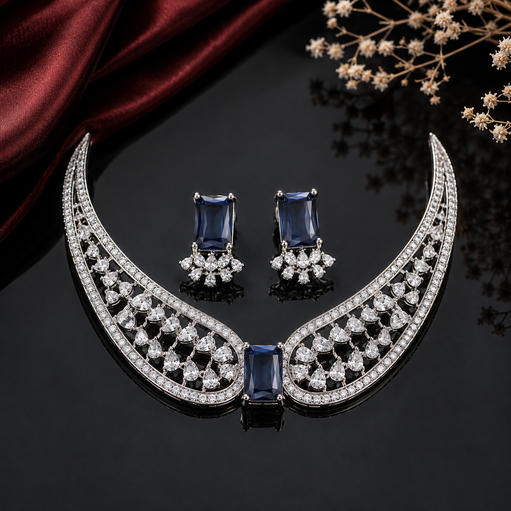 Elegant AD necklace set with intricate openwork detailing, rectangular centerpiece and matching statement earrings