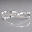 Roman Twist Cross-Over Bangle