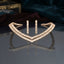 Gold-Tone Double-Row Baguette CZ V-Shape Collar Necklace and Bar Drop Earrings Set flat lay on dark grey mirror surface with teal velvet and burgundy silk backdrop showing rigid V-shape double-row baguette CZ collar necklace beside two slim vertical baguette CZ bar drop earrings with mirror reflections below