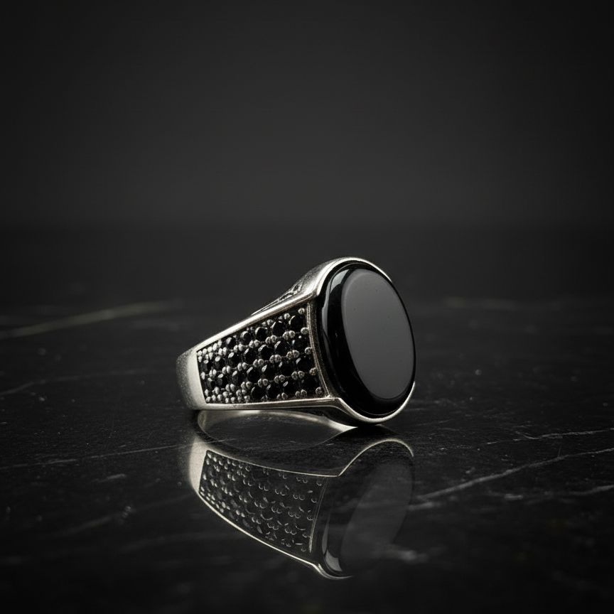 Black oval signet ring