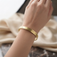 Roman Numeral Gold Bangle Bracelet