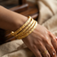 Textured Gold Bangle Set (4 Pieces)