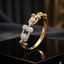 Gold Interlocking Bow Bangle