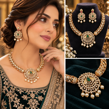 Gold-tone bridal necklace and matching drop earrings with a green center stone, clear accents, and pearl-style dangles