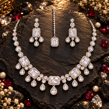 Silver-tone American Diamond bridal set with rectangular halo necklace, teardrop accents, matching drop earrings and maang tikka