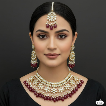 Gold Plated Kundan Jewelry Set with Red Beads – Rs. 5450