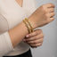 Gold‑Tone American Diamond Oval Link Bangles - Rs. 2950