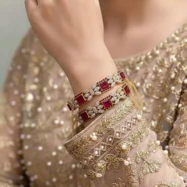 Traditional gold-plated ruby stone bracelet set with intricate design, priced Rs. 3850