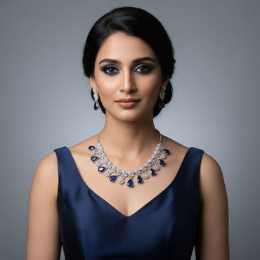 Luxury sapphire blue stone necklace set with matching earrings, priced Rs. 6250