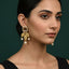 Traditional gold-toned champagne stone leaf pearl earrings, priced Rs. 1150