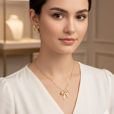 Stainless Steel Bow Locket Set - Rs 850