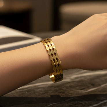 Gilded Lattice Triple-Row Gold Bangle – Rs. 950